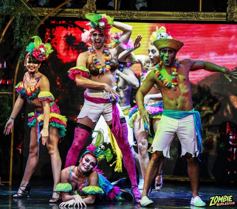 male and female in costumes performs in zombie burlesque