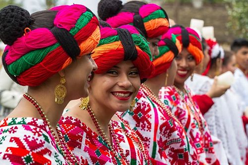 women wearing colorful traditional costumes