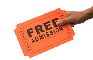 hand holding free admission ticket