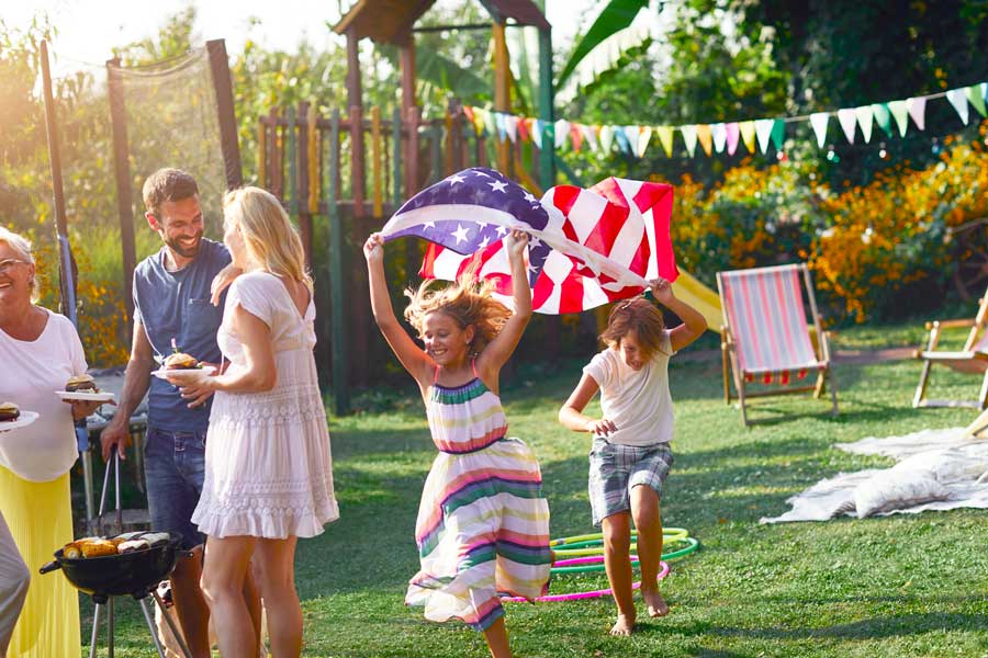 kids-playing-outside-with-a-flag