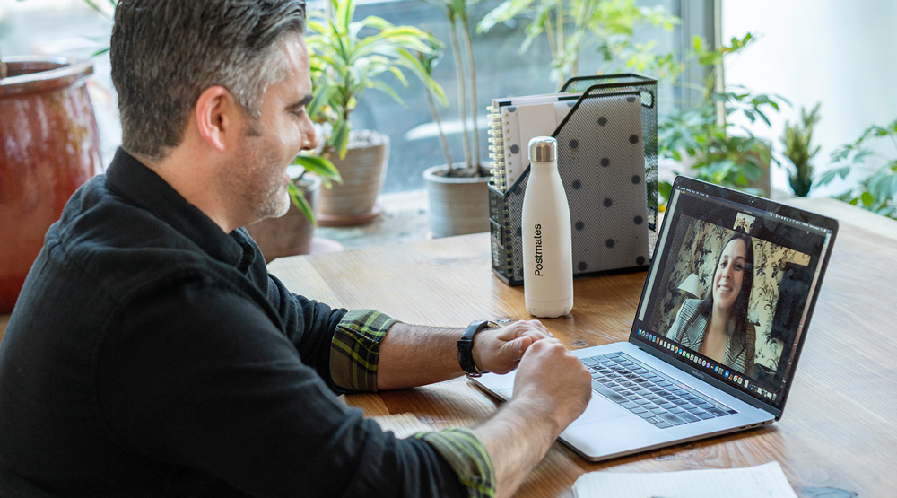 a-man-watching-a-webinar-on-his-computer